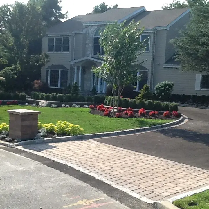 Asphalt and paver driveway installation