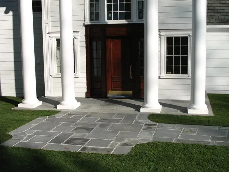 Stoop installation — brick and bluestone