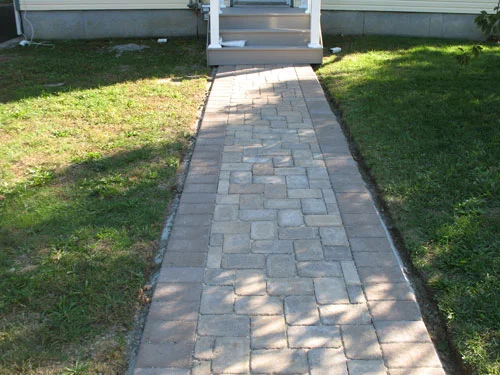 Curved walkway with garden lighting